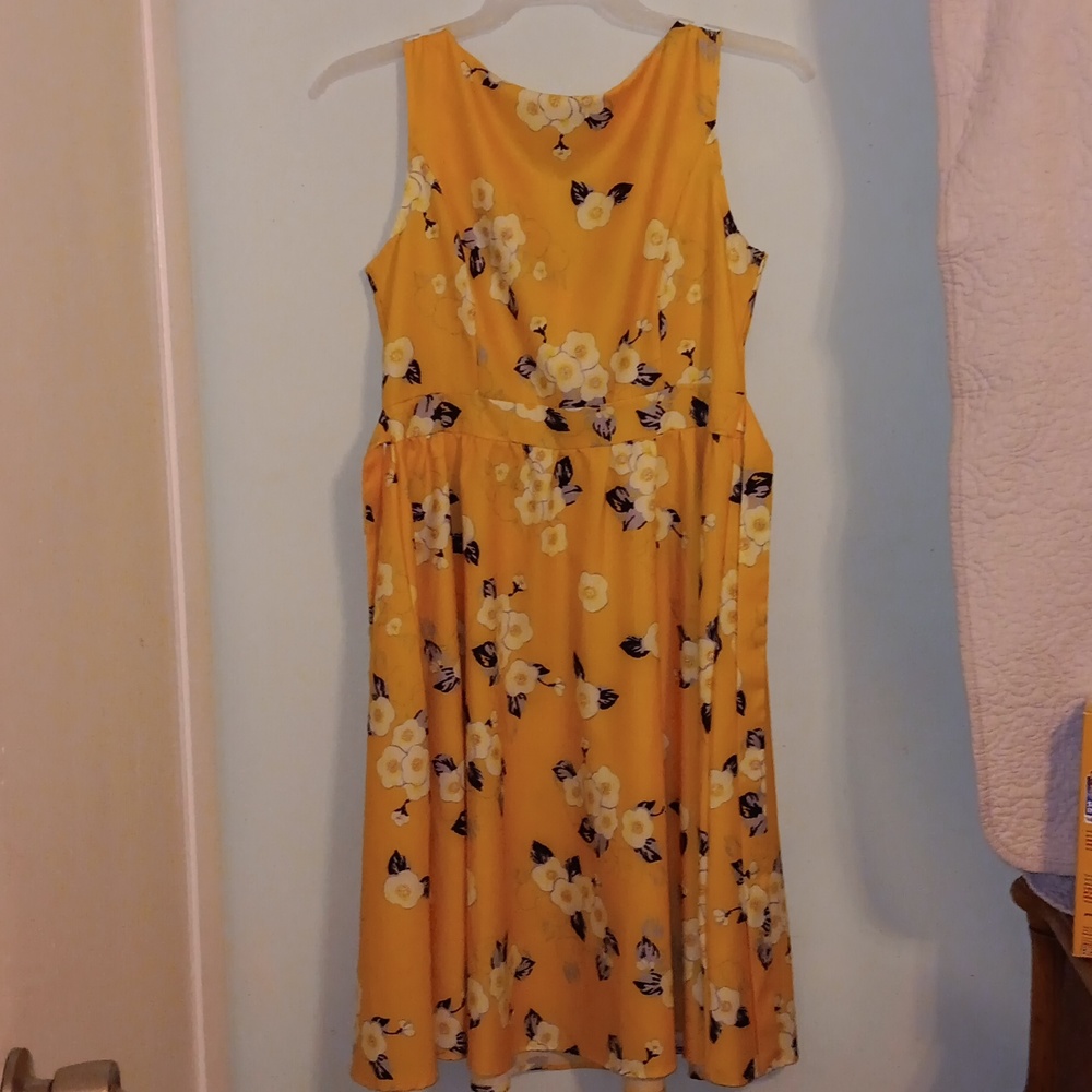 Yellow with floral pattern sleeveless dress
